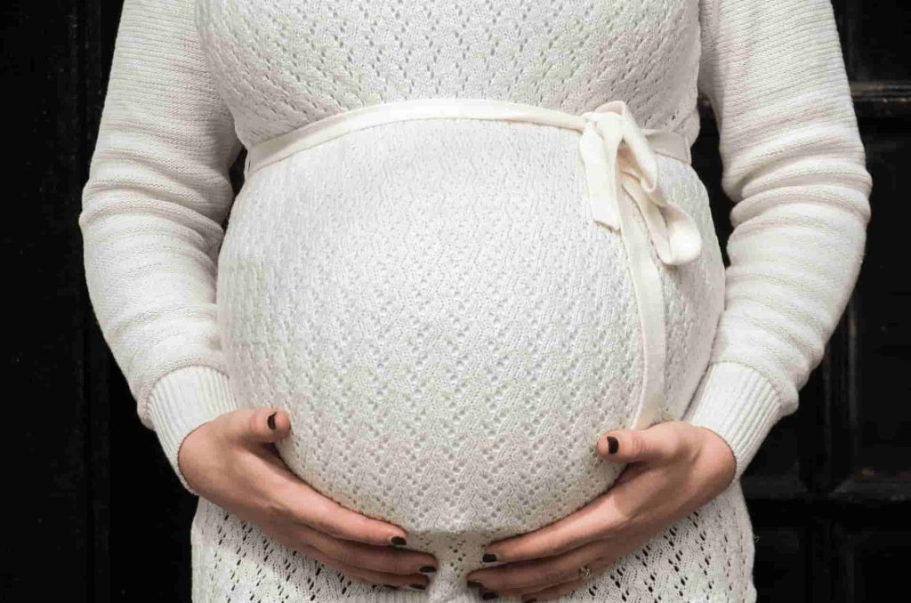 a heavily pregnant woman - Zion Outreach Worldwide